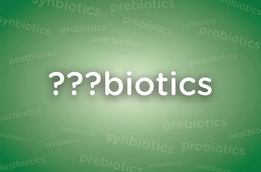 Probiotics text with question marks over faded synbiotics and prebiotics words on green