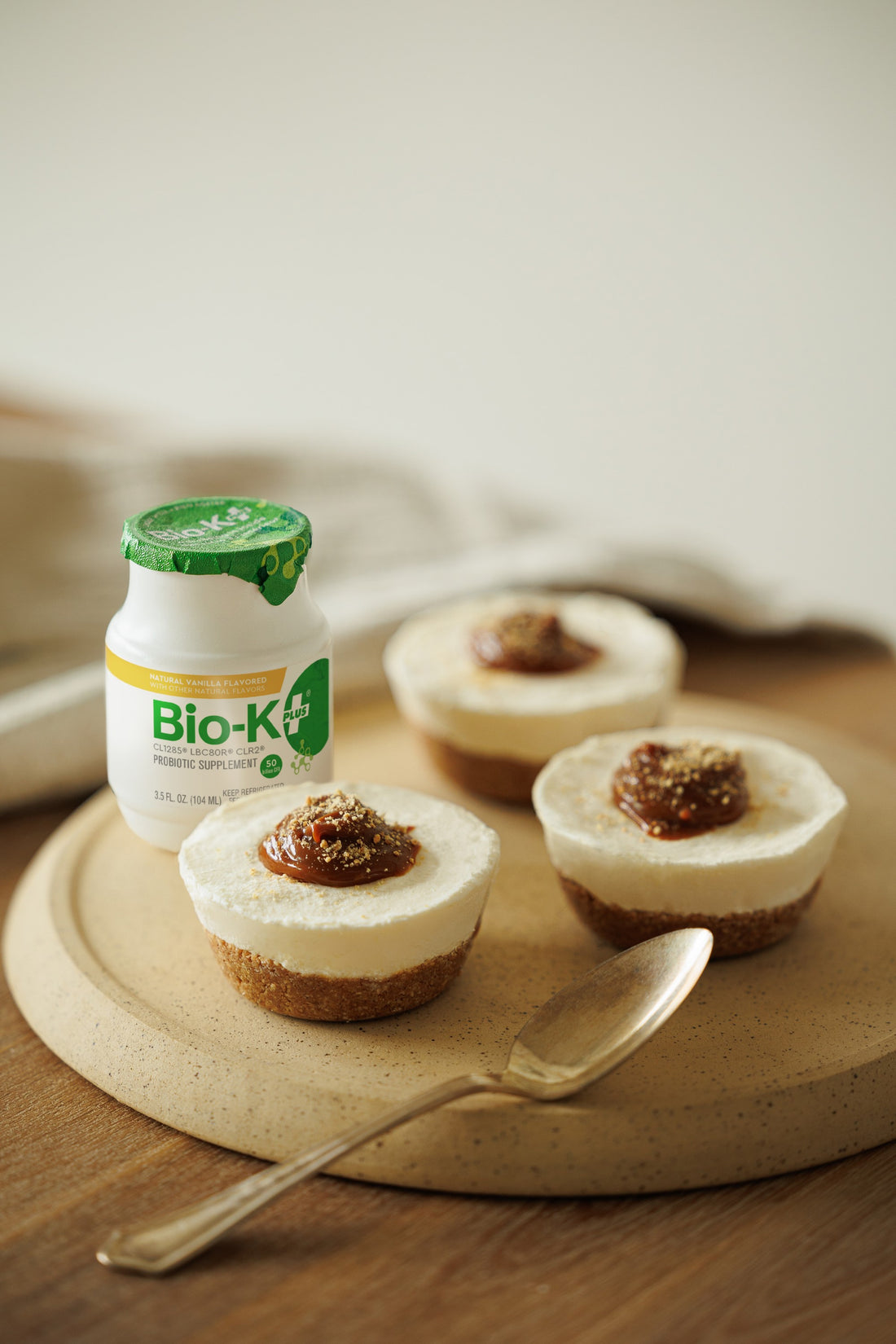 Mini cheesecakes with a bottle of Bio-K+ - Vanilla Flavor